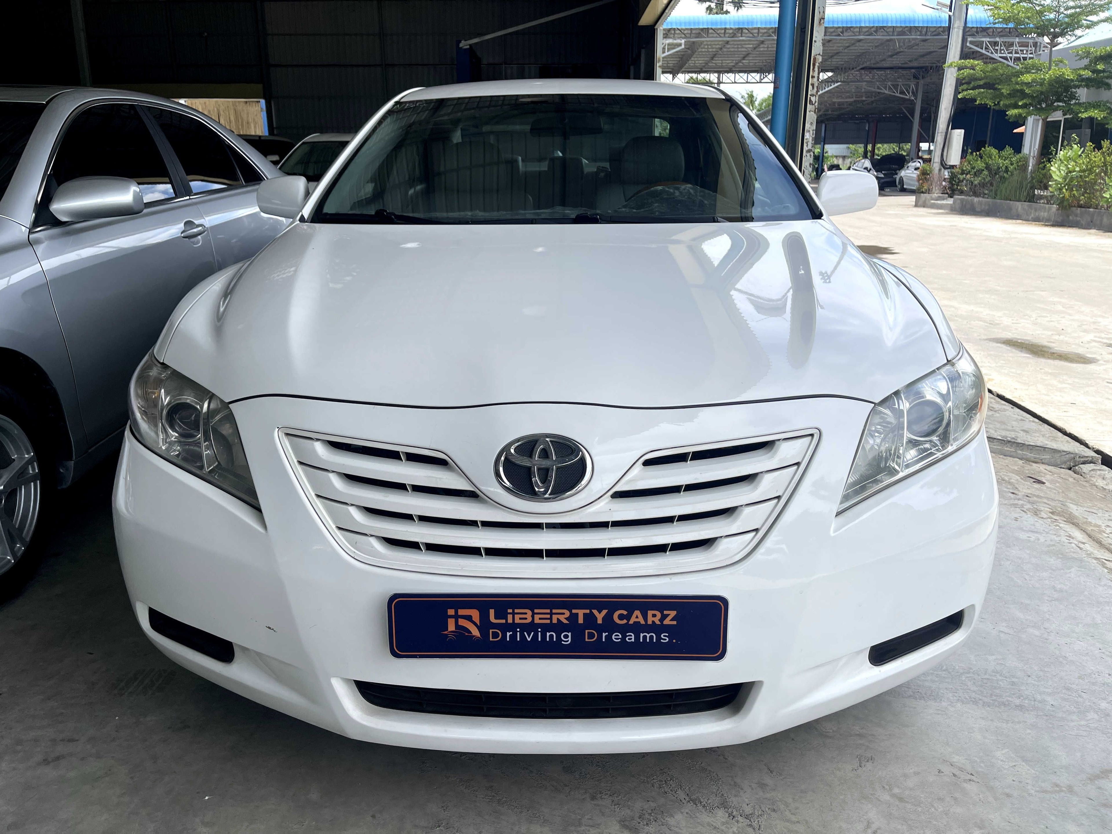 តូយ៉ូតា Camry Le 2009