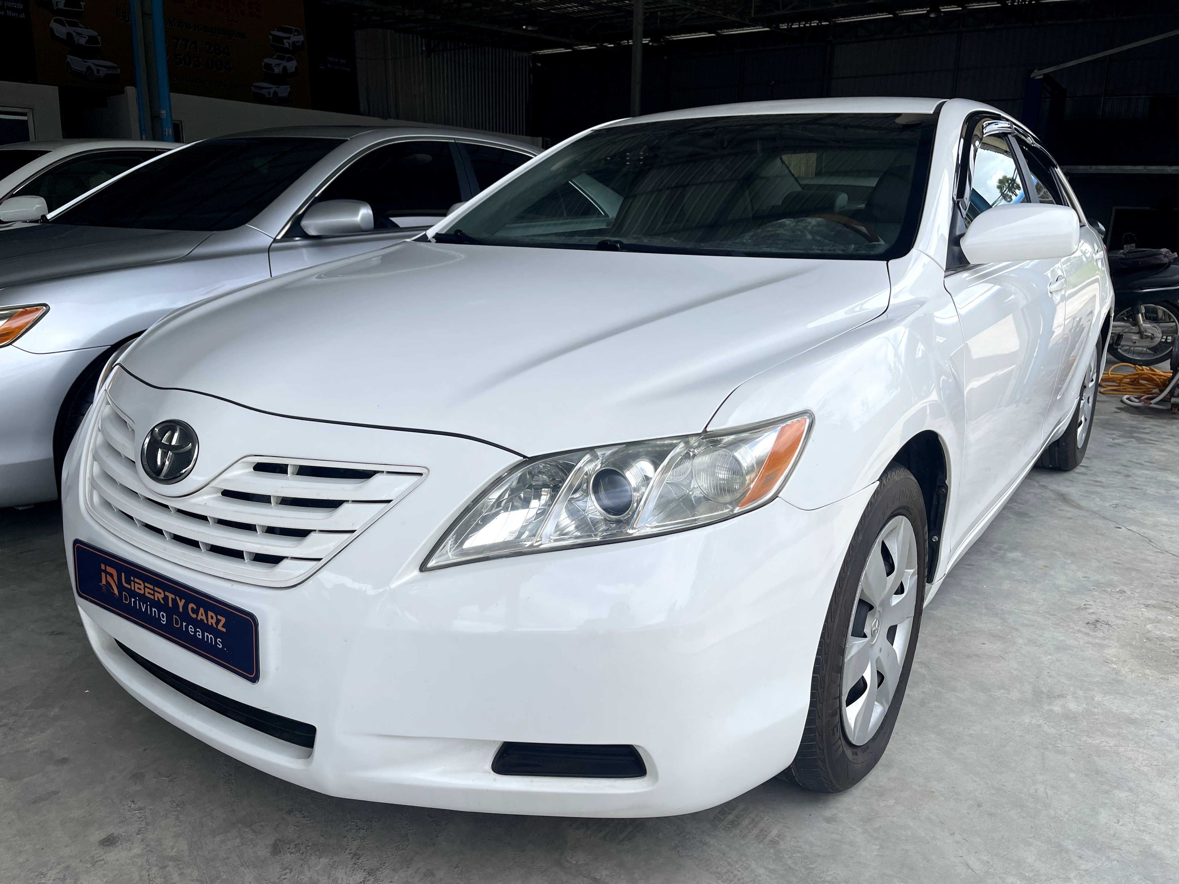 តូយ៉ូតា Camry Le 2009